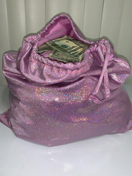 Bolsa de dinero con brillo rosa